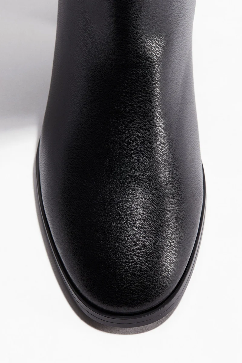 اتش اند ام بووت بطول يصل للركبة